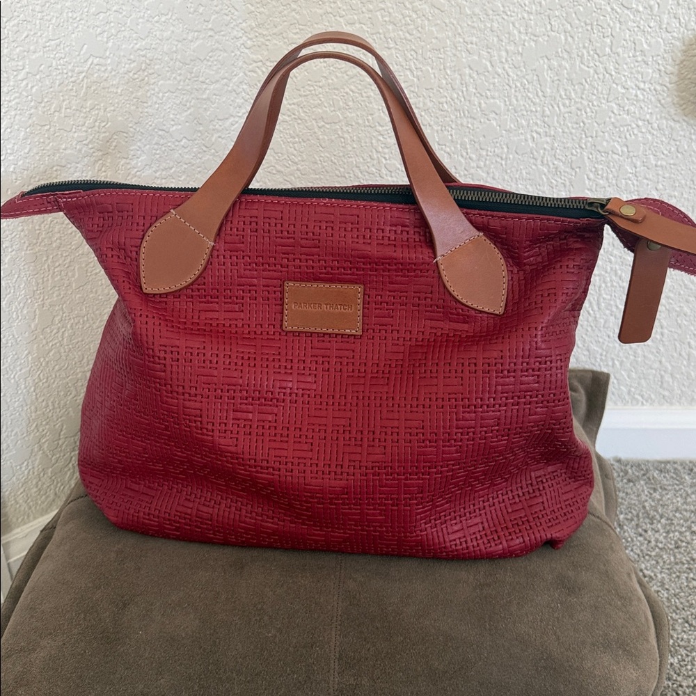 Parker Thatch red “Charlie” bag